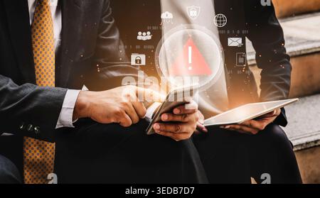 Red warning triangle representing a cybersecurity threat or data breach alert, surrounded by digital security and network protection icons Stock Photo