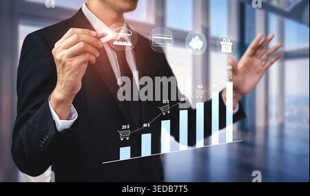Businessman in Suit Presenting Digital Graph with Growth Indicators and Icons for Finance, Shopping, and Gift Concepts in Modern Office Setting Quark. Stock Photo