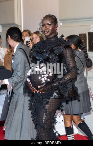 Adut Akech wearing Thom Brown departs the Pierre Hotel for 2026 Met ...