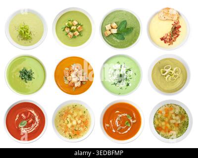 Different tasty soups in bowls isolated on white, collage. Top view Stock Photo
