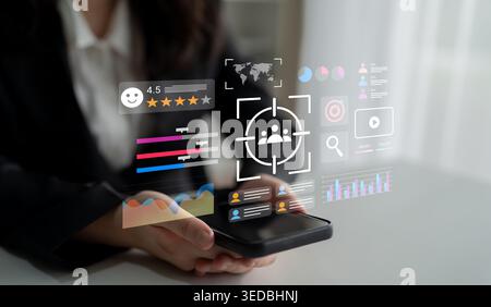 A professional engages with a smartphone displaying digital analytics and data visualization, symbolizing modern business strategy and user engagement Stock Photo