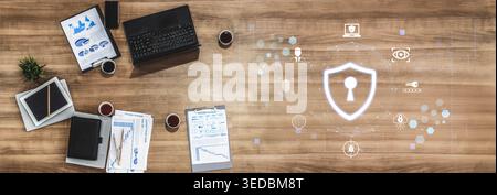 Digital Security Concept Illustration with Laptop and Business Documents on Wooden Desk Featuring Shield Icon and Data Protection Graphics Fluxor. Stock Photo