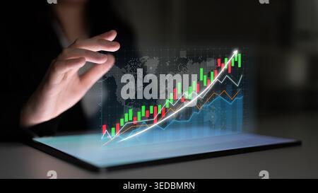 Innovative digital display of financial growth on a tablet shows charts and trends, emphasizing progress and strategy in modern business environments Stock Photo