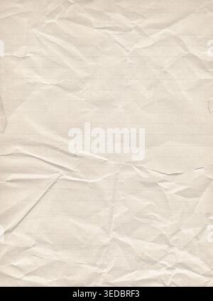 Crumpled lined paper texture background with deep wrinkles, soft folds and aged beige surface tone Stock Photo