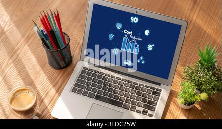 Cost reduction, cost saving concept shown on computer screen brisk, corporate business efficiently save cost and company resources by reduction of Stock Photo