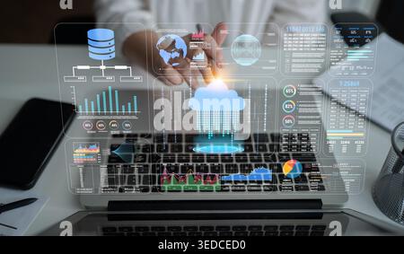 Modern Digital Interface with Data Visualization and Cloud Computing Concept over Laptop Screen Fluxor. Stock Photo