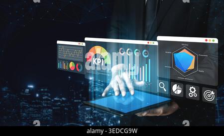 Dynamic digital interface displaying data analytics and KPI metrics on a tablet, representing modern business intelligence and strategic decision Stock Photo