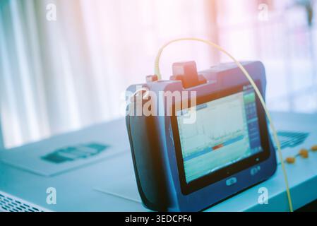 A close-up view of a modern medical monitor displaying diagnostic information. This advanced technology aids healthcare professionals in patient monit Stock Photo