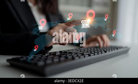 A businessperson interacts with a virtual map, displaying location pins, symbolizing digital marketing strategy and global connectivity while using a Stock Photo