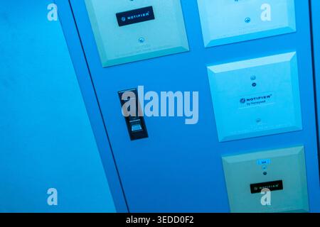 Control panel featuring buttons and lights in a blue hue. This image captures the essence of modern technology and interface design for various applic Stock Photo