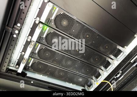 This image captures a modern data center with advanced server racks displaying optimized technology infrastructure for efficient data management and p Stock Photo