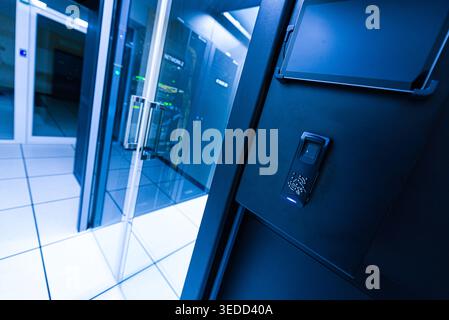 This image showcases a modern data center featuring an electronic access control system, emphasizing security and advanced technology in infrastructur Stock Photo