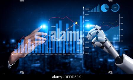 A striking image depicting a human hand and a robotic hand engaging with digital graphs, symbolizing collaboration between humans and technology in Stock Photo