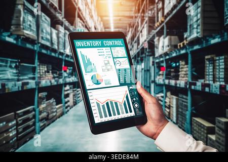 Warehouse management innovative software in computer for real time monitoring of goods package delivery . Computer screen showing smart inventory Stock Photo
