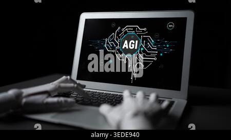 Artificial Intelligence Display on Laptop with Robotic Hand Representing Advanced General Intelligence Concept Haptic. Stock Photo