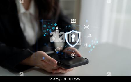 Modern Businessperson Engaging with Mobile Device Featuring Digital Security Icons, Data Protection, and Privacy Concepts in a Professional Setting Stock Photo