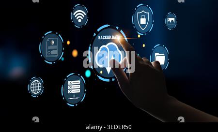 Hand Interacting with Digital Interface for Cloud Backup Data and Technology Icons on a Dark Background Haptic. Stock Photo