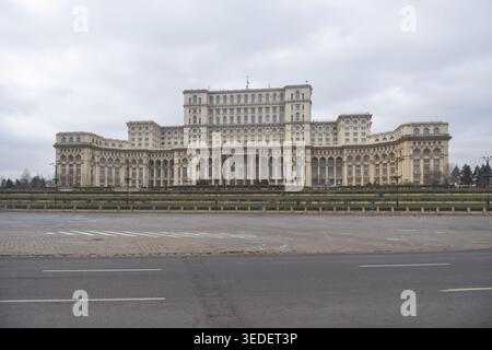 Front view of the monumental Palace of the Parliament building under an overcast sky in Constitution Square - Bucuresti, Romania - March 15 2026. Stock Photo