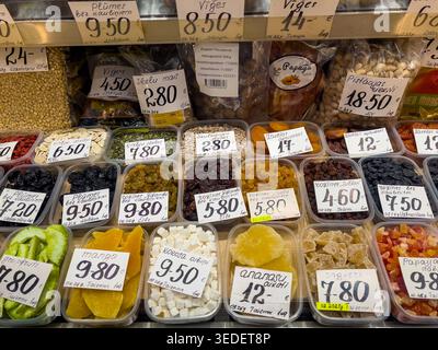 Riga, Latvia - April 03, 2026: Assortment of natural dried fruits, nuts and seeds at city central marke, showing clean product selection, everyday foo Stock Photo