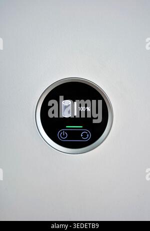 Air purifier filter status display, suggesting cleaner air, a healthier indoor environment and fewer allergy related particles. Stock Photo
