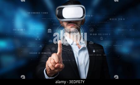 A businessman wearing a virtual reality headset interacts with a futuristic digital interface. The scene reflects modern technology and innovation in Stock Photo