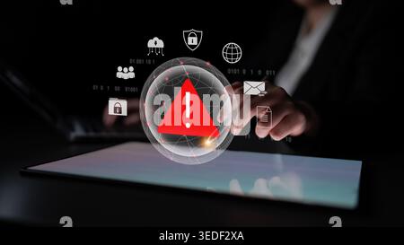 Red warning triangle representing a cybersecurity threat or data breach alert, surrounded by digital security and network protection icons Stock Photo