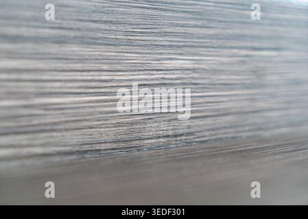 This image showcases a detailed close-up of a wooden surface, highlighting its unique textures and natural patterns. Ideal for design and background u Stock Photo