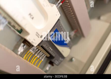 A close-up view of an electronics control panel featuring various components, digital readouts, and intricate wiring, ideal for showcasing industrial Stock Photo