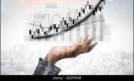 A dynamic hand reaches for financial growth, illustrated with charts and graphs. This image represents the success and progress in business Stock Photo