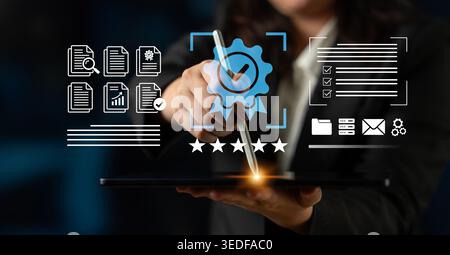 A business professional digitally signing a document on a tablet, surrounded by icons representing certification and security in a modern office Stock Photo