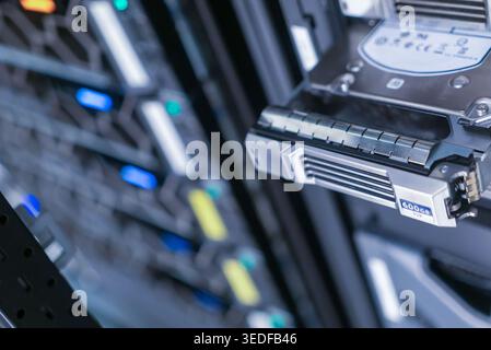 This image showcases advanced server technology, capturing high-detail components and storage devices in a modern computing environment. Ideal for tec Stock Photo