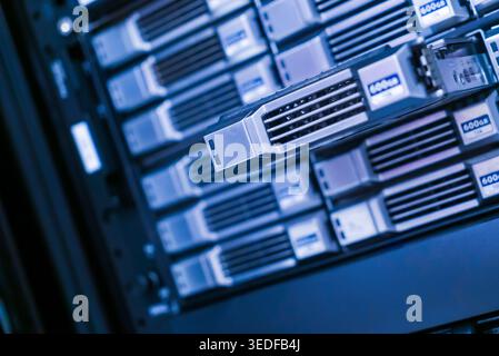 This image showcases advanced data storage technology within a server rack, emphasizing modern computing solutions crucial for data management and pro Stock Photo