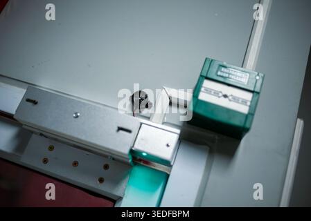 Close-up view of electronic components on a workbench. The image features a variety of gadgets and tools showcasing a detailed technology setup for ex Stock Photo