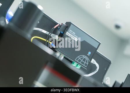 This image showcases a high-tech device featuring intricate circuit connections, highlighting modern technology and its application in innovative equi Stock Photo