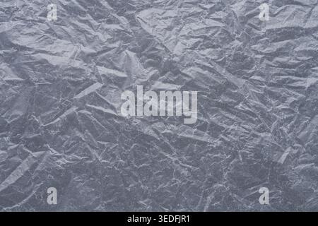 Wrinkled plastic texture gray background with grunge pattern Stock Photo