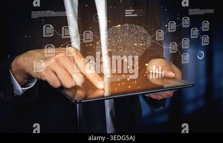 Professional businessman interacts with a digital tablet displaying AI brain graphics and data analytics, showcasing innovation and technology in a Stock Photo