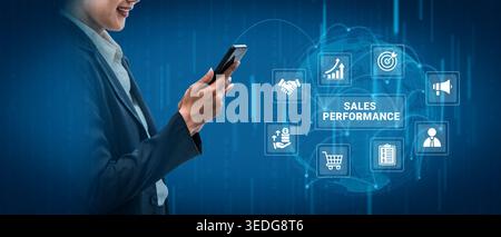 A business professional interacts with a smartphone amidst digital icons representing sales performance metrics, showcasing modern commerce strategies Stock Photo
