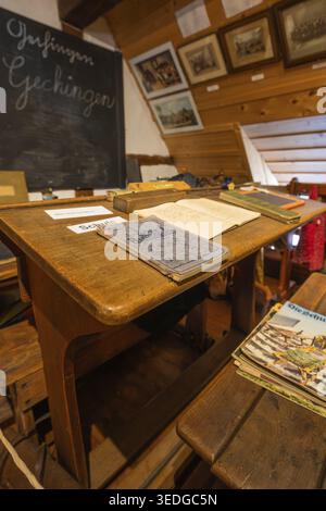 An old school desk with blackboard and vintage learning material, local history museum, Gechingen, Hecken and Gaeu region, Calw district, Germany Stock Photo
