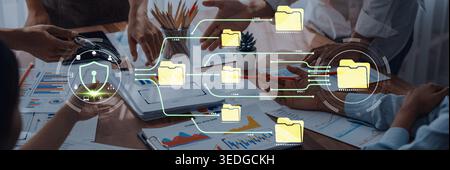 Collaborative Digital Workspace with File Organization, Data Management, and Cybersecurity Concept in Business Meeting Atmosphere Fluxor. Stock Photo