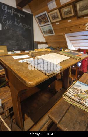 An old school desk with blackboard and vintage learning material, local history museum, Gechingen, Hecken and Gaeu region, Calw district, Germany Stock Photo