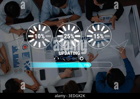 A dynamic office scene displaying a team engaged in data analysis with progress indicators and charts, showcasing collaboration and productivity in Stock Photo
