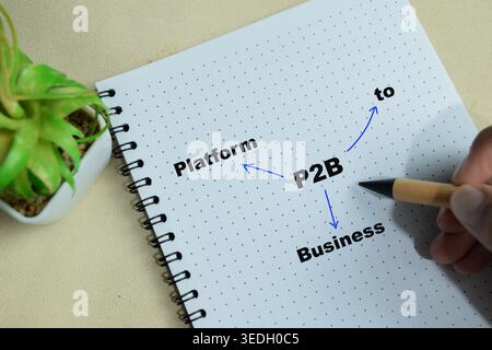 Concept of P2B - Platform to Business write on book isolated on Wooden Table Stock Photo
