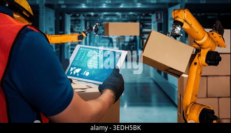 Smart robot arm systems for innovative warehouse and factory digital technology . Automation manufacturing robot controlled by industry engineering Stock Photo