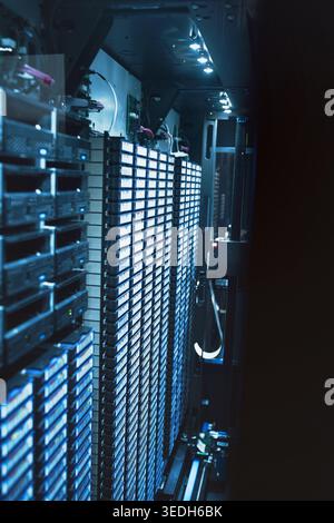 Server room, infrastructure and cybersecurity system with network for digital storage facility. Electronics, AI hardware and machine learning for Stock Photo