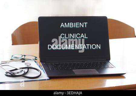 environmental clinical documentation. ai and healthcare. Healthcare professional showing a digital tablet. Stock Photo