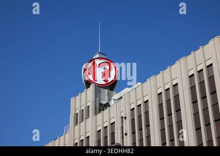 Close up view of the red and white sign on top of the Isetan flagship store in Shinjuku City, Tokyo, Japan. Stock Photo