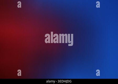 Blue and red abstract gradient background with soft vignette and subtle grain, front view, luminous digital backdrop, copy space. Stock Photo