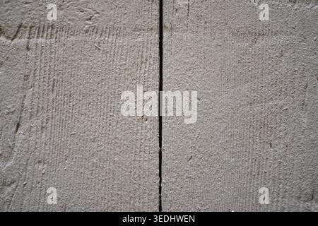 Light grey concrete wall texture with rough grainy cement surface in Clermont-Ferrand Stock Photo