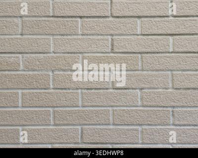 Beige brick wall texture seamless background pattern Stock Photo