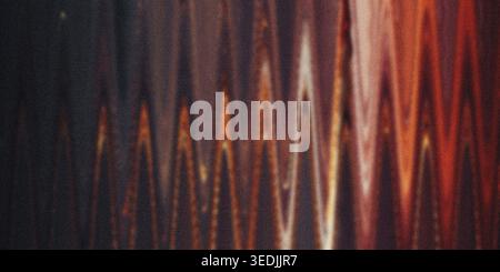 A textured abstract background displaying a series of vertical waves, blending dark charcoal tones with vibrant orange and red gradients. Stock Photo